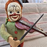 Klovn-med-violin-gammel-Schuco-figur-optroek-Germany.-gammelt-legetoej